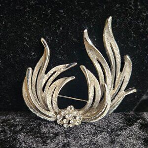 Vintage Silver toned signed JP Brooch with Rhinestone clustered center
